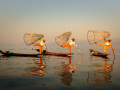 Three Fisherman Ready to Drop Their Nets